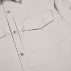 Surchemise Stone Island Ghost gris poudré - détail poche