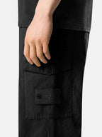 Pantalon cargo Stone Island Ghost noir - détail badge