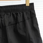 Short Nike à logo brodé multicolore