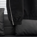 Coupe-vent à capuche Nike 2013 avec logo découpé au dos